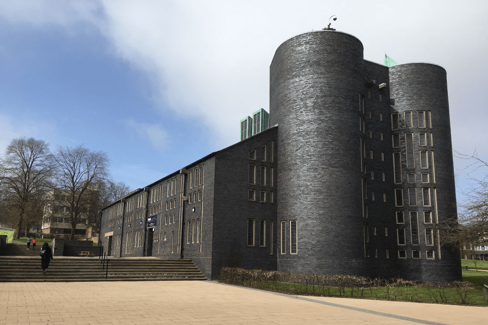 The photo shows the exterior of Keele University Chapel