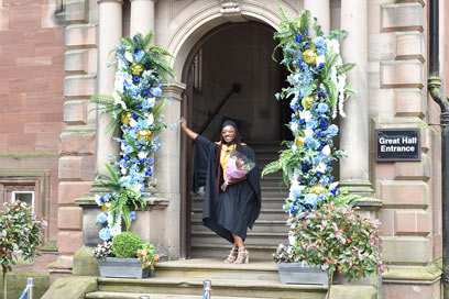 Graduate photo outside Keele Hall