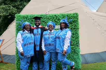 Graduate photo outside Keele Hall