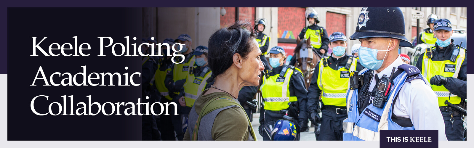 A police officer engaging a member of public.