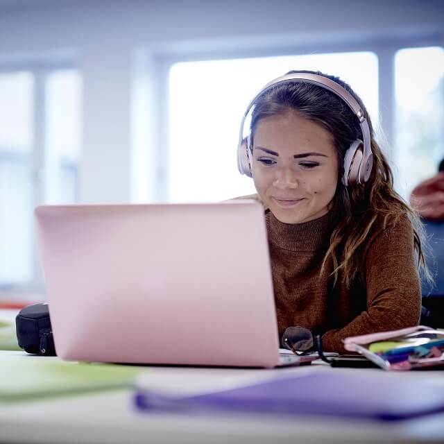 Student with laptop.