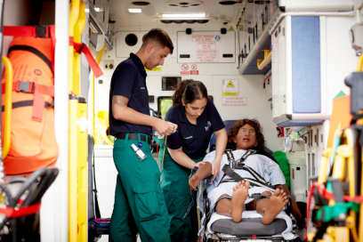 Paramedic students undertaking a simulation activity with the emergency training ambulance