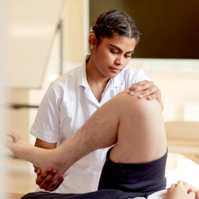 A physiotherapy student and a patient at Keele University.