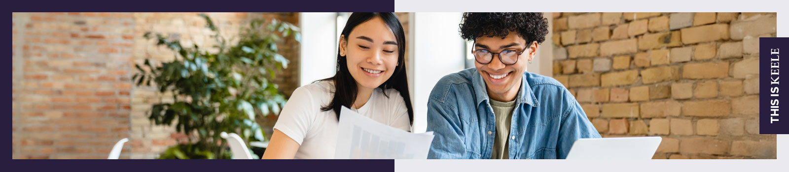 Two students working at a desk together.