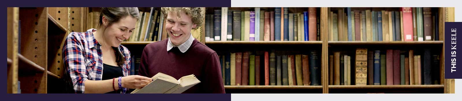 Students reading a book in Keele Hall's library