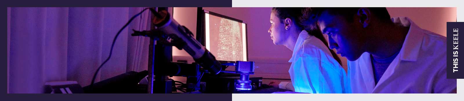 A female student working in a lab on a computer